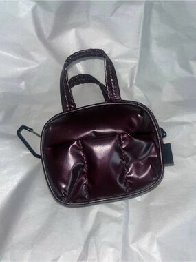 Calpak glazed cherry Luka bag charm  $32